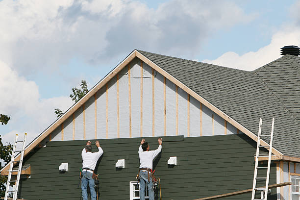Professional Siding technician working in Yadkinville, NC